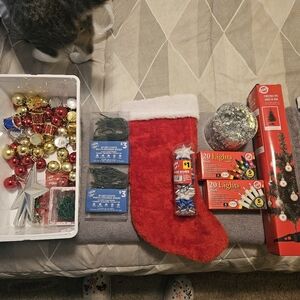 Red Christmas Stocking with Holiday Decorations & Mini Tree